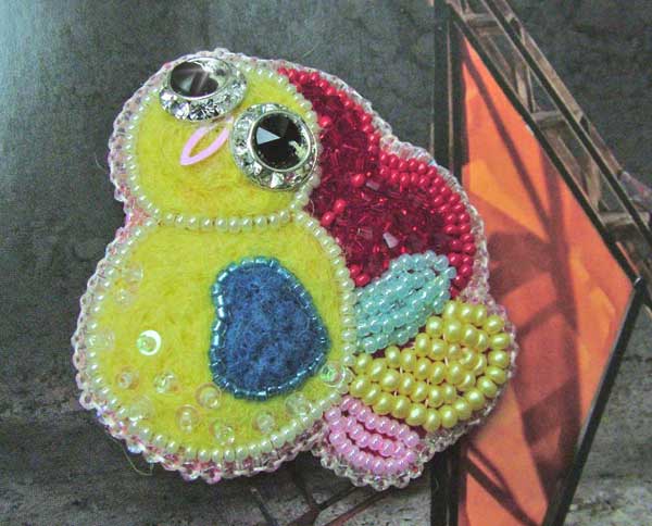 Sunshine beaded felted brooch